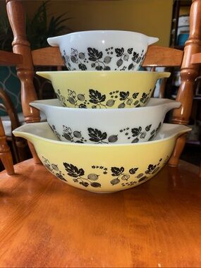 Pyrex Yellow and White Nesting Mixing Bowls with Black Fruit Pattern